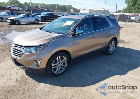 2018 Chevrolet Equinox Premier z USA, uszkodzony, nr VIN 2GNAXWEX9J6196335